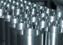 Stacked metal tubes.